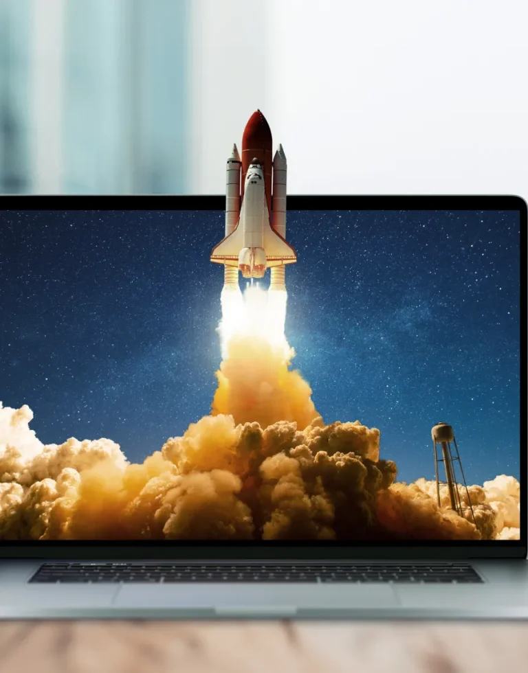 Rocket launch emerging from laptop screen